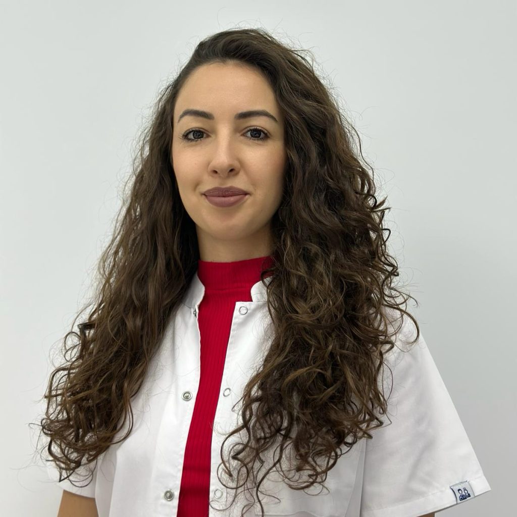 Dr. Coravu Adelina